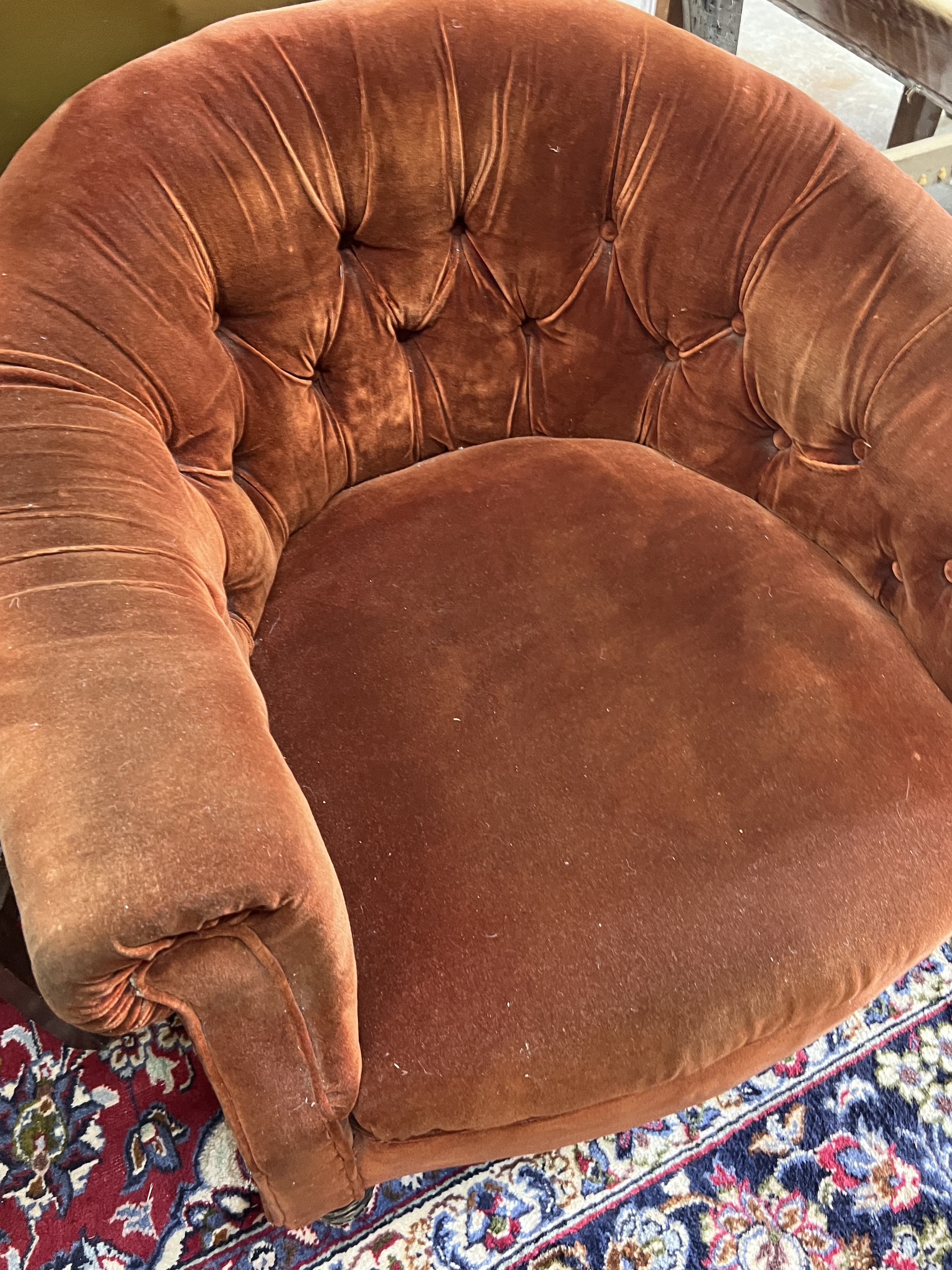 A Victorian tub framed armchair upholstered in buttoned fabric, width 82cm, depth 74cm, height 70cm